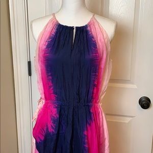 Stunning silk adjustable halter dress.